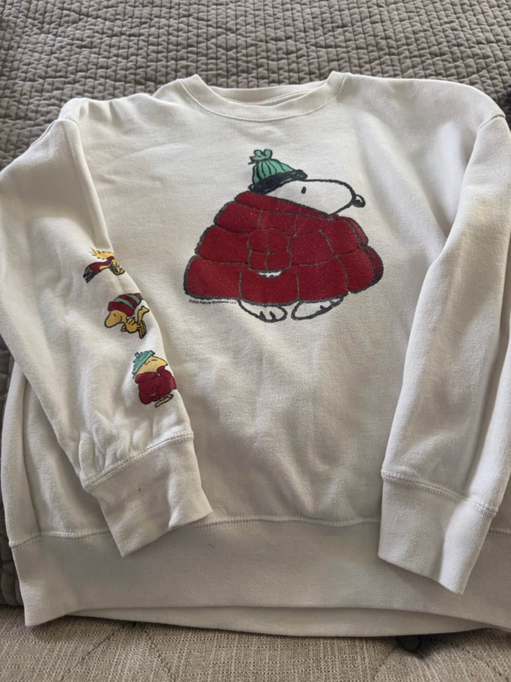 White kids Snoopy Puffer Graphic Sweatshirt. 11/12